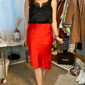 Red satin asymmetrical skirt w/ slit